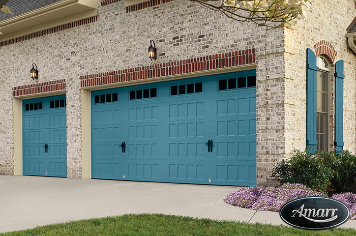Brick home with custom-color carriage style garage doors